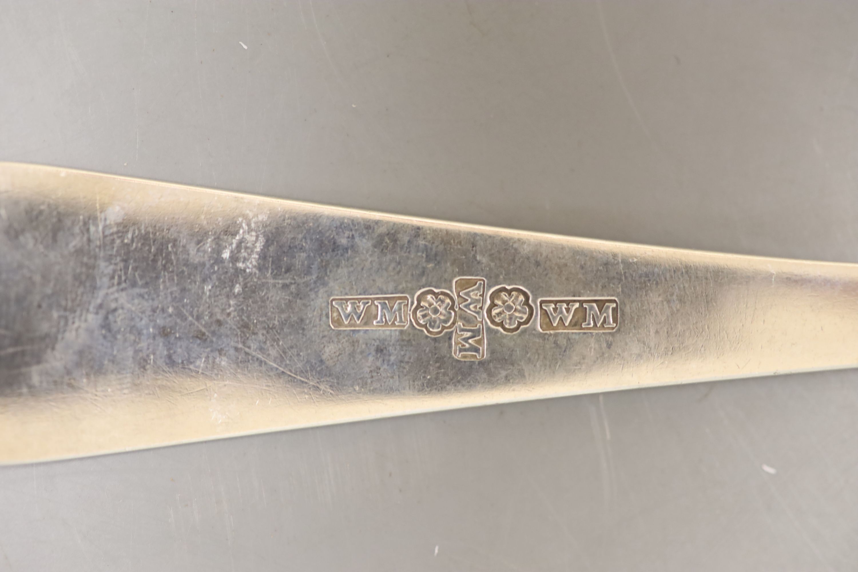 Two 19th century Scottish provincial Montrose tablespoons, James Sturrock (fiddle pattern), c.1860 and William Mill, c.1812, a pair of sugar tongs by the latter, a teaspoon by John Glenny? and a late 18th century Hanovar